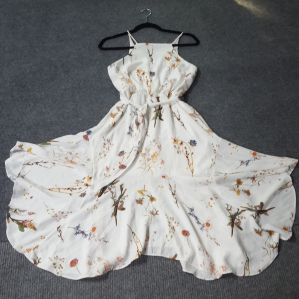 Midi dress in cream with flower print.